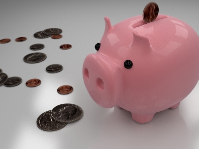 Piggy bank with coins